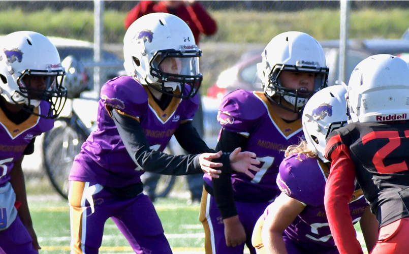 Rooks QB Receiving the Snap
